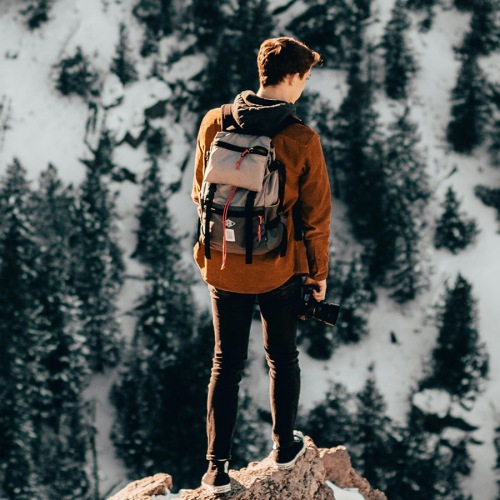 a man standing on a mountain