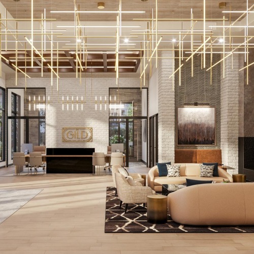 a spacious room with a fireplace and tall windows