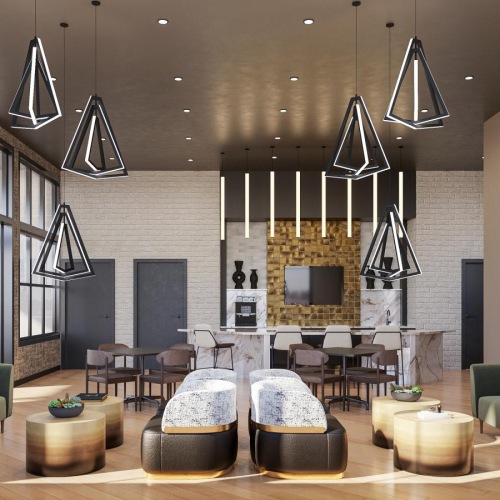 a room with a couch and chairs